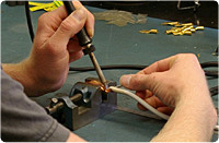 Assembling test leads custom and standard configurations from Arbiter Systems, Inc.